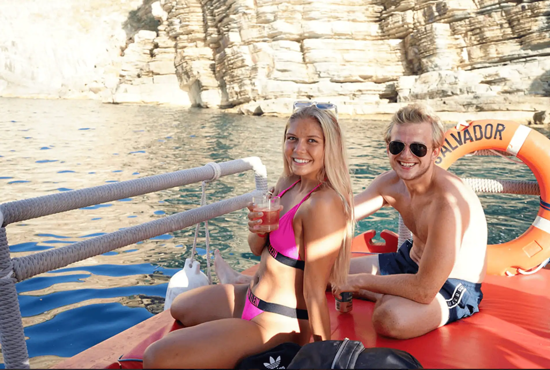 Two friends enjoying the sun on the boat