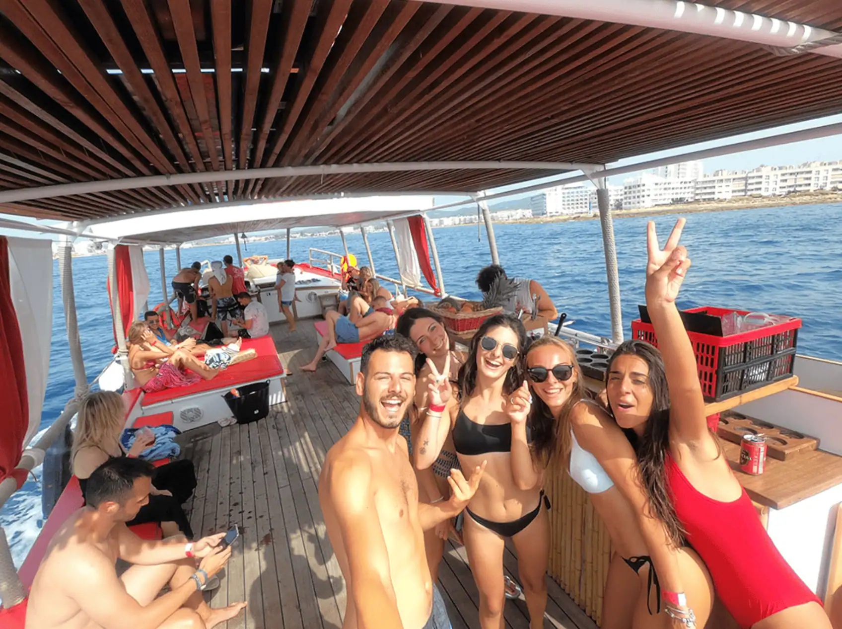 Captain Luigi with guests enjoying the sunset