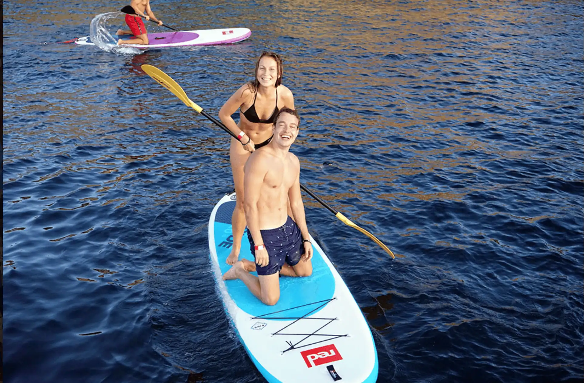 Couple paddleboarding near Salvador Ibiza
