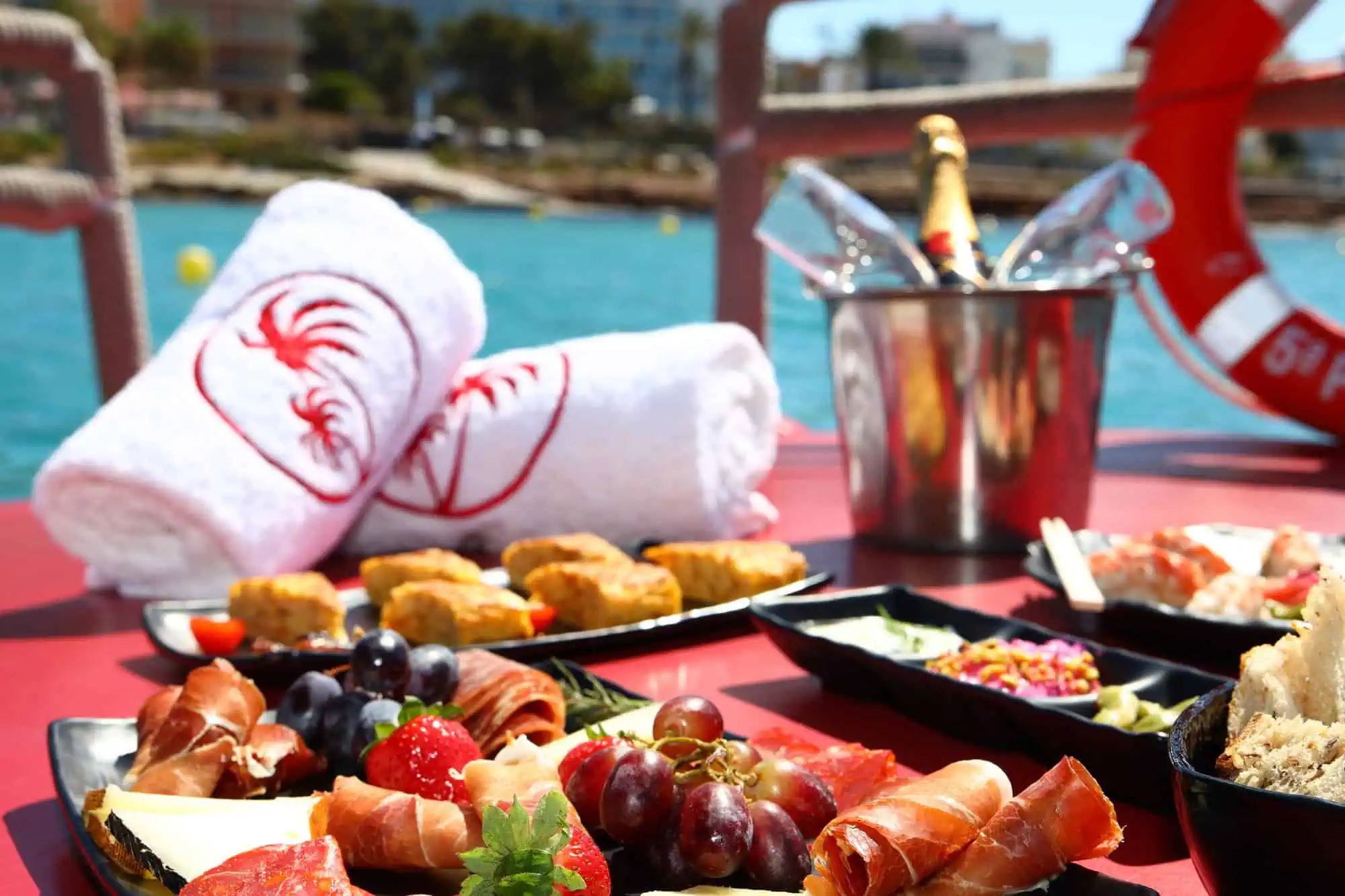 Elegant wedding setup with tapas and champagne on Salvador Ibiza boat