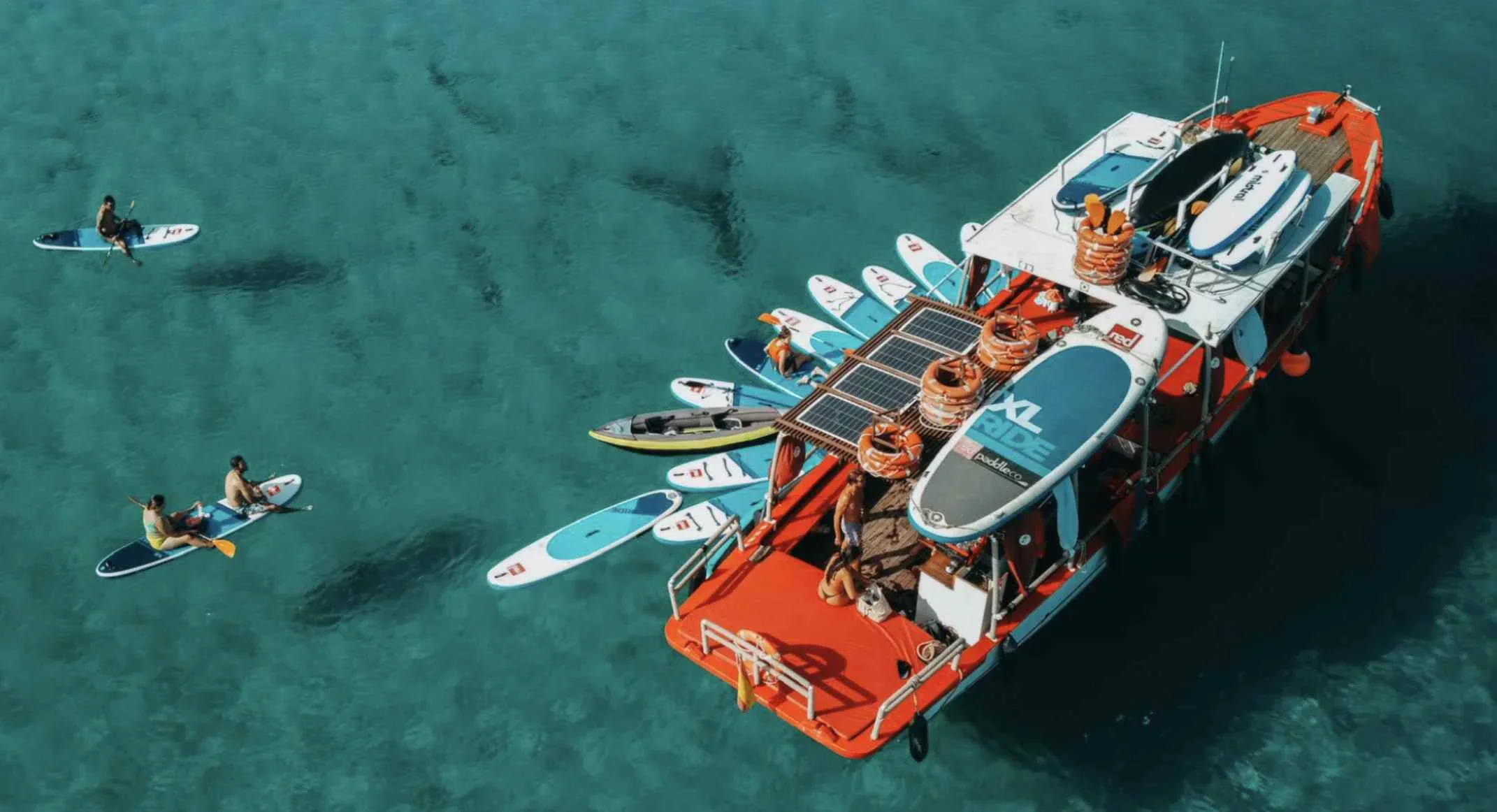 Aerial drone view of the Salvador charter boat in Ibiza, ready for a boat trip